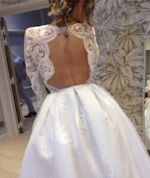 Ivory wedding dress with cut out back detail using ivory lace Charvi 10