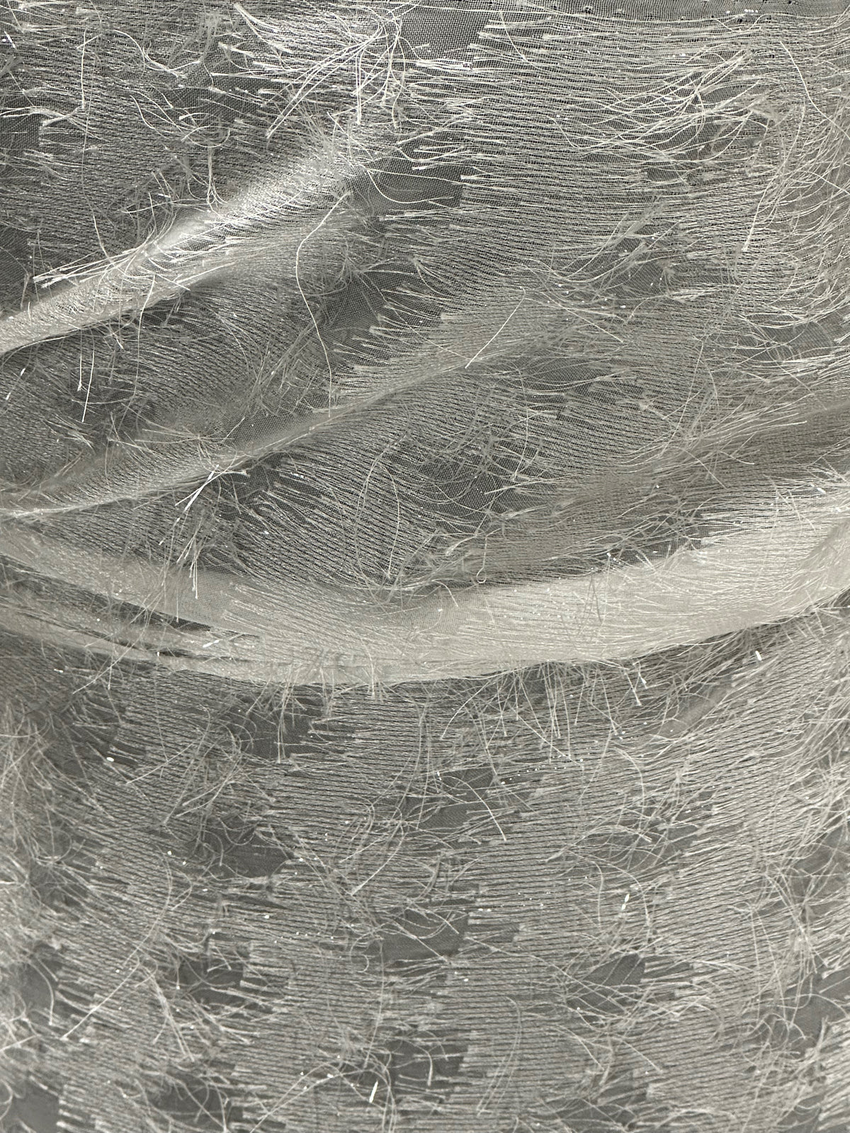 Tissu à pompons ivoire scintillant - Affection