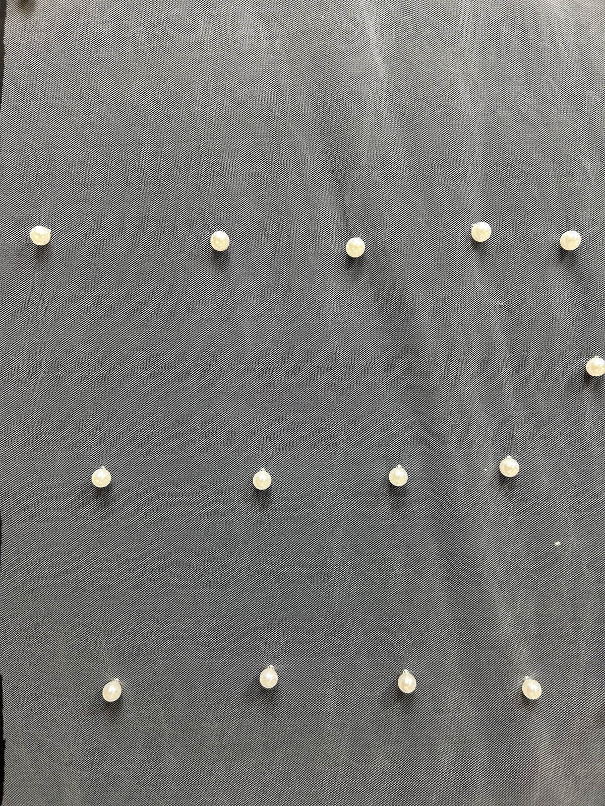 Tulle ivoire embelli de perles - Décadence