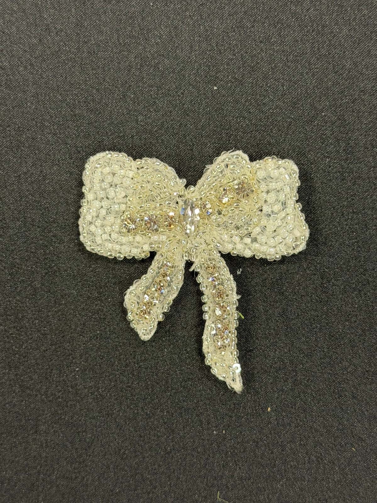 Ivory Bow Shaped Motif - T895