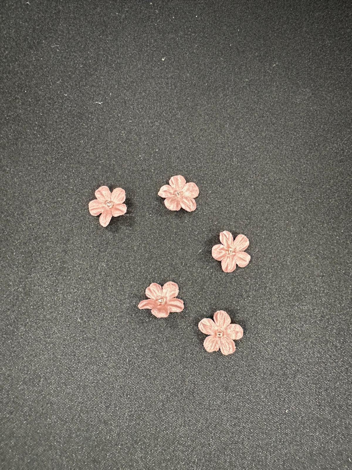 Fleurs découpées au laser rose clair - M11 (Sachet de 144)