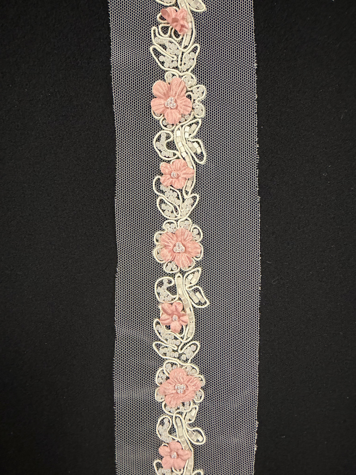 Bordure en perles rose clair - T51