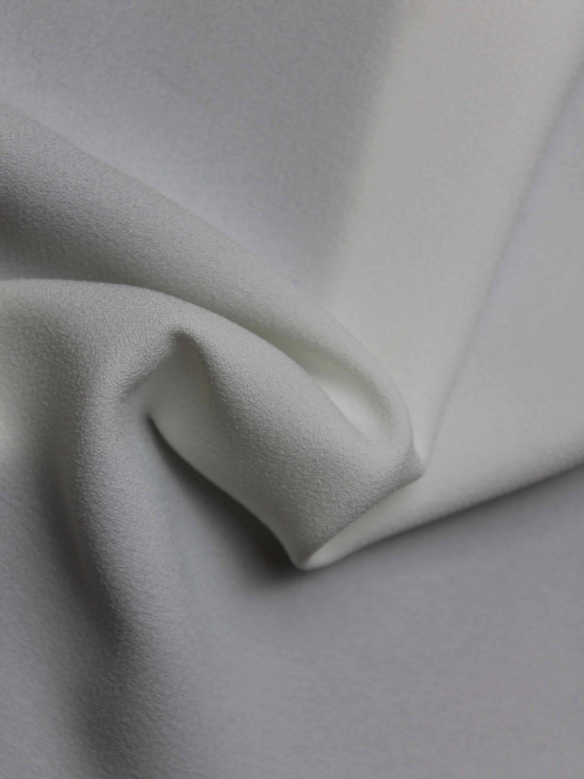 Crêpe polyester ivoire M/Wt - P59