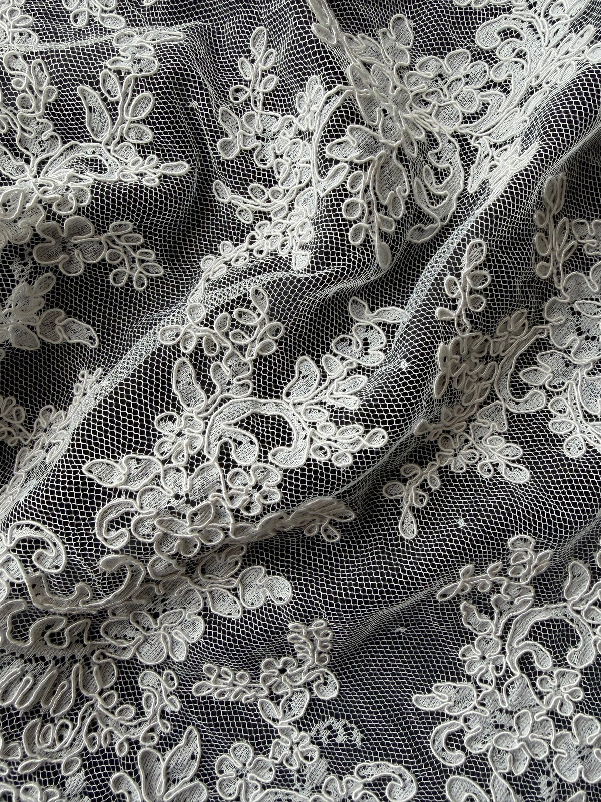 Dentelle cordée ivoire - P637