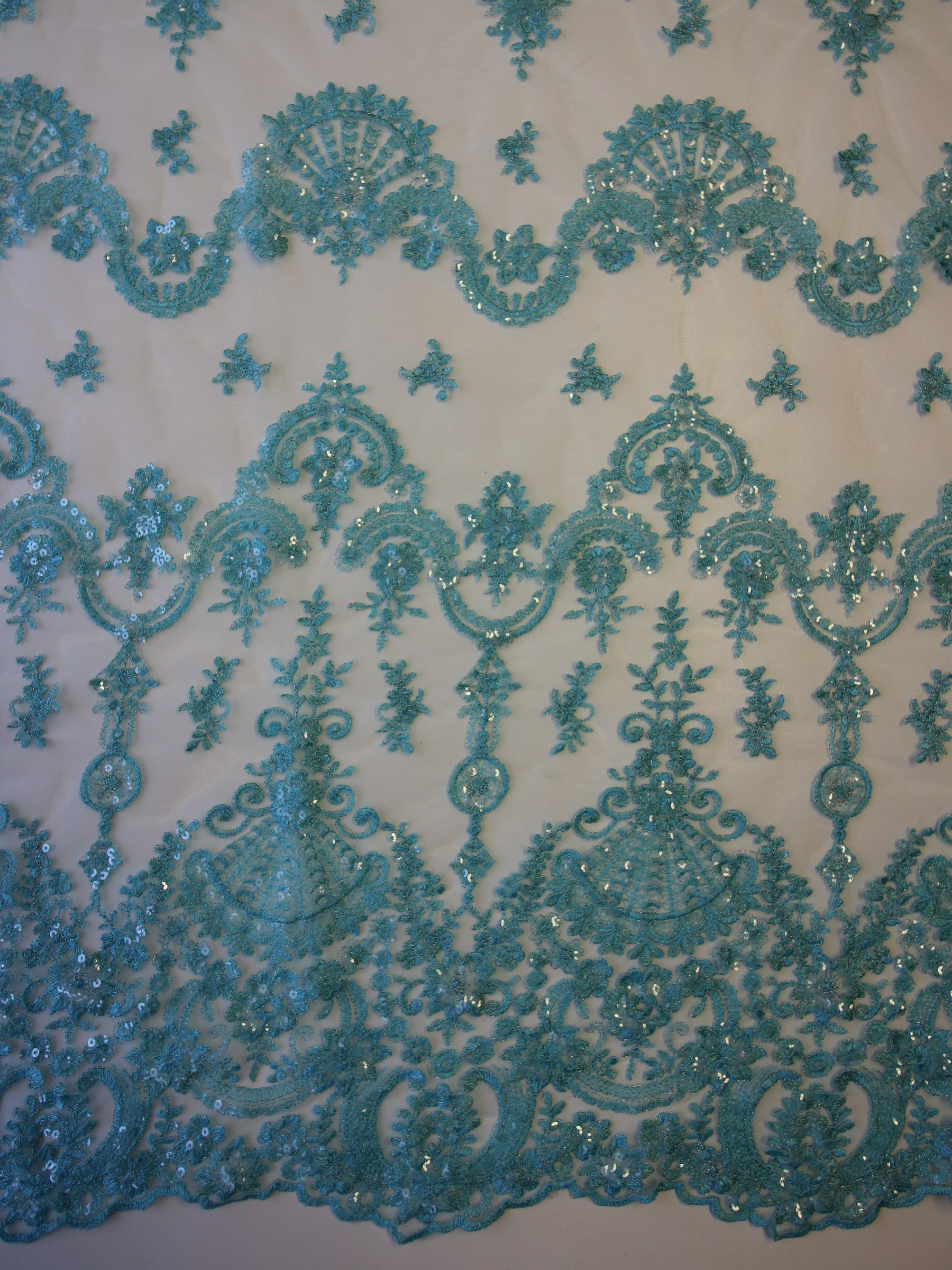 Dentelle Turquoise - Rubis.