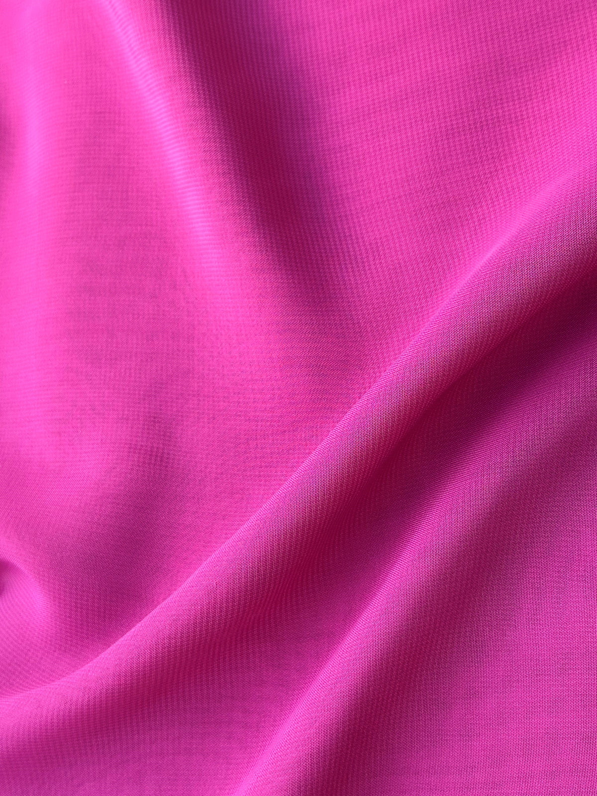 Mousseline de polyester magenta - Benevolence