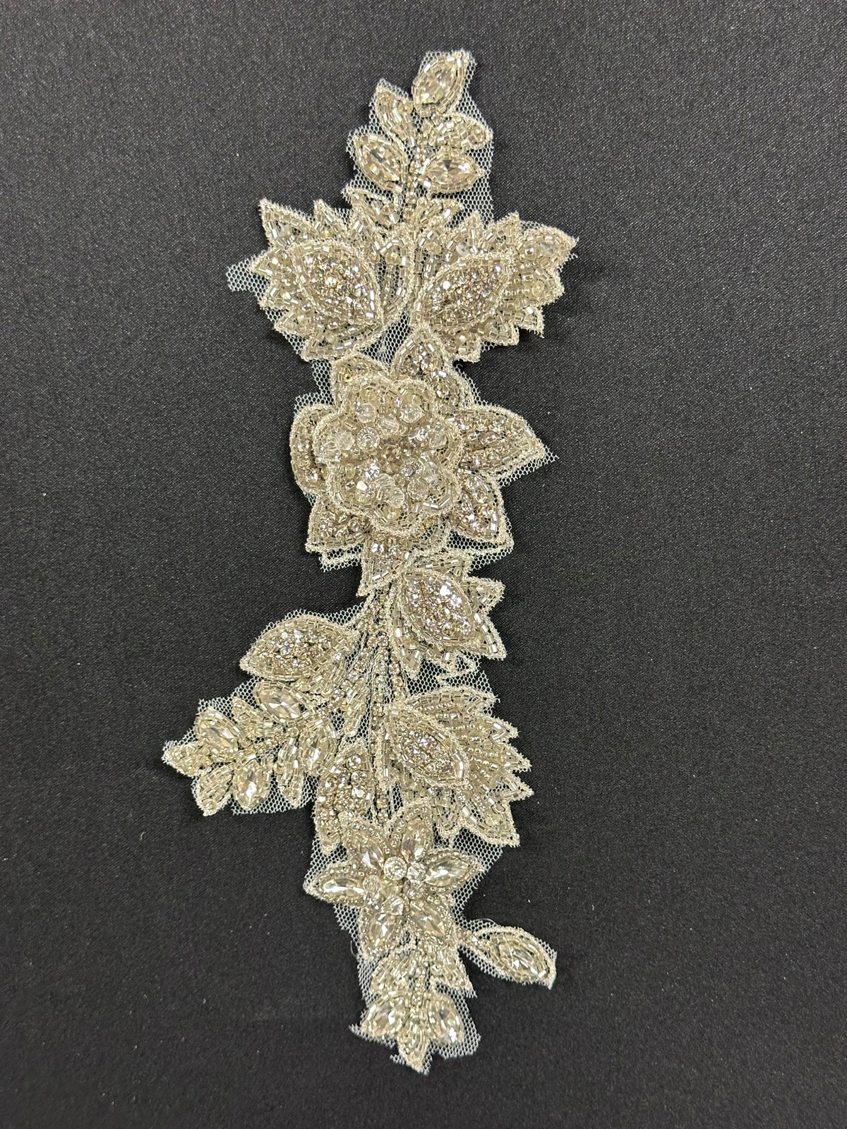 Broderie de cristal (ivoire) – Gravité