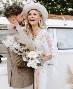 Boho bride wedding dress featuring fringed lace Essence 9