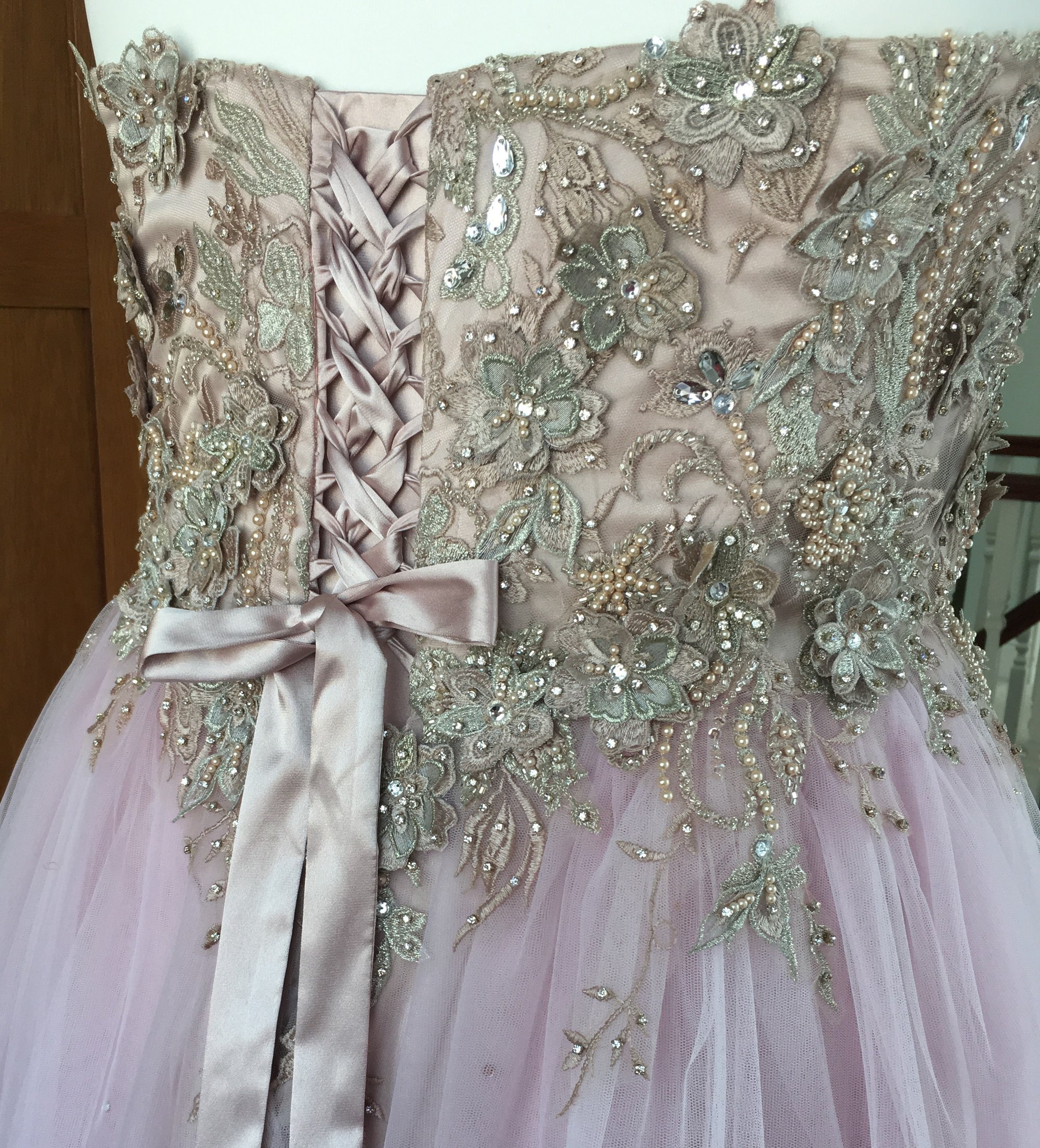The creation process of the bodice using blush beaded lace Renata 4