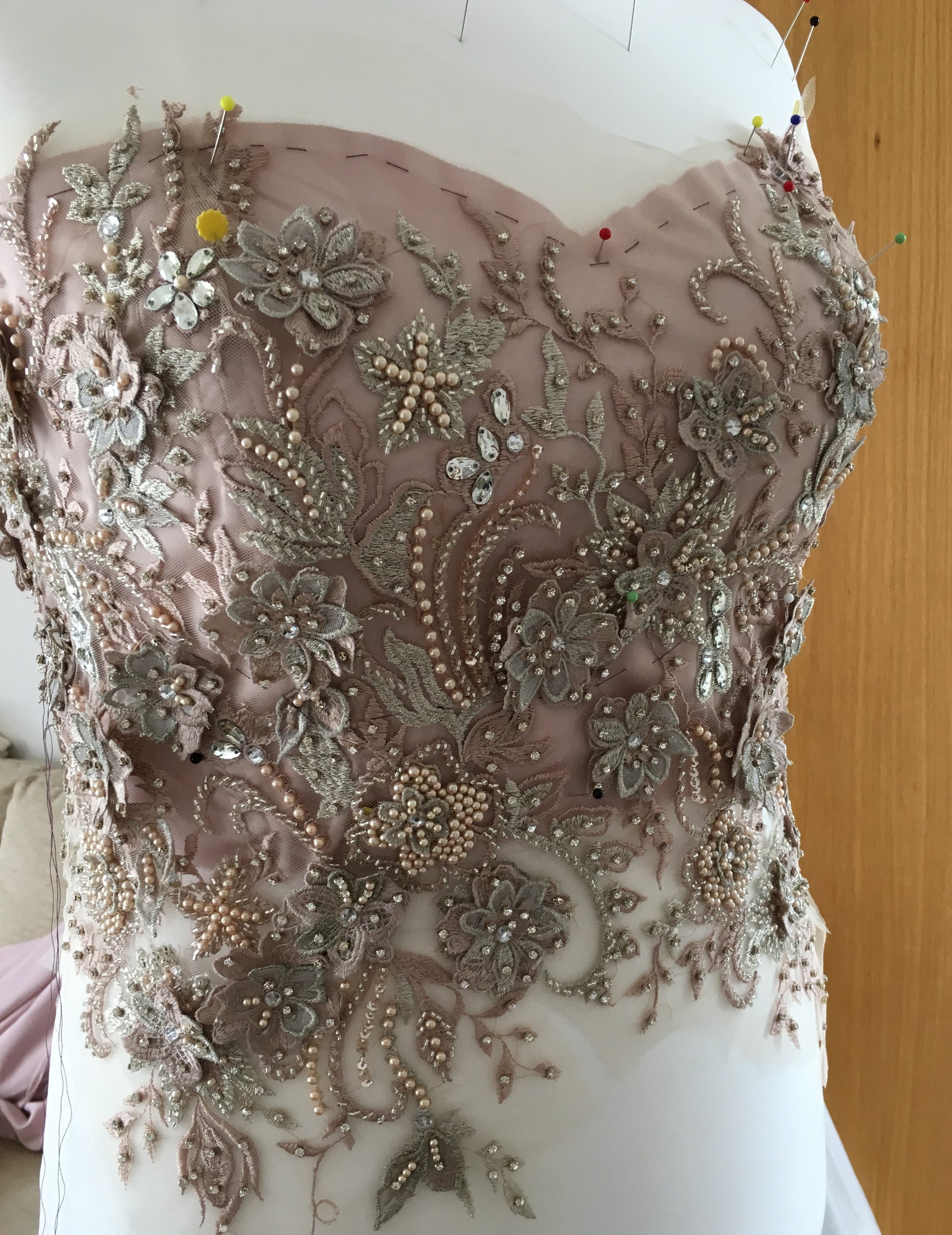 The creation process of the bodice using blush beaded lace Renata 1