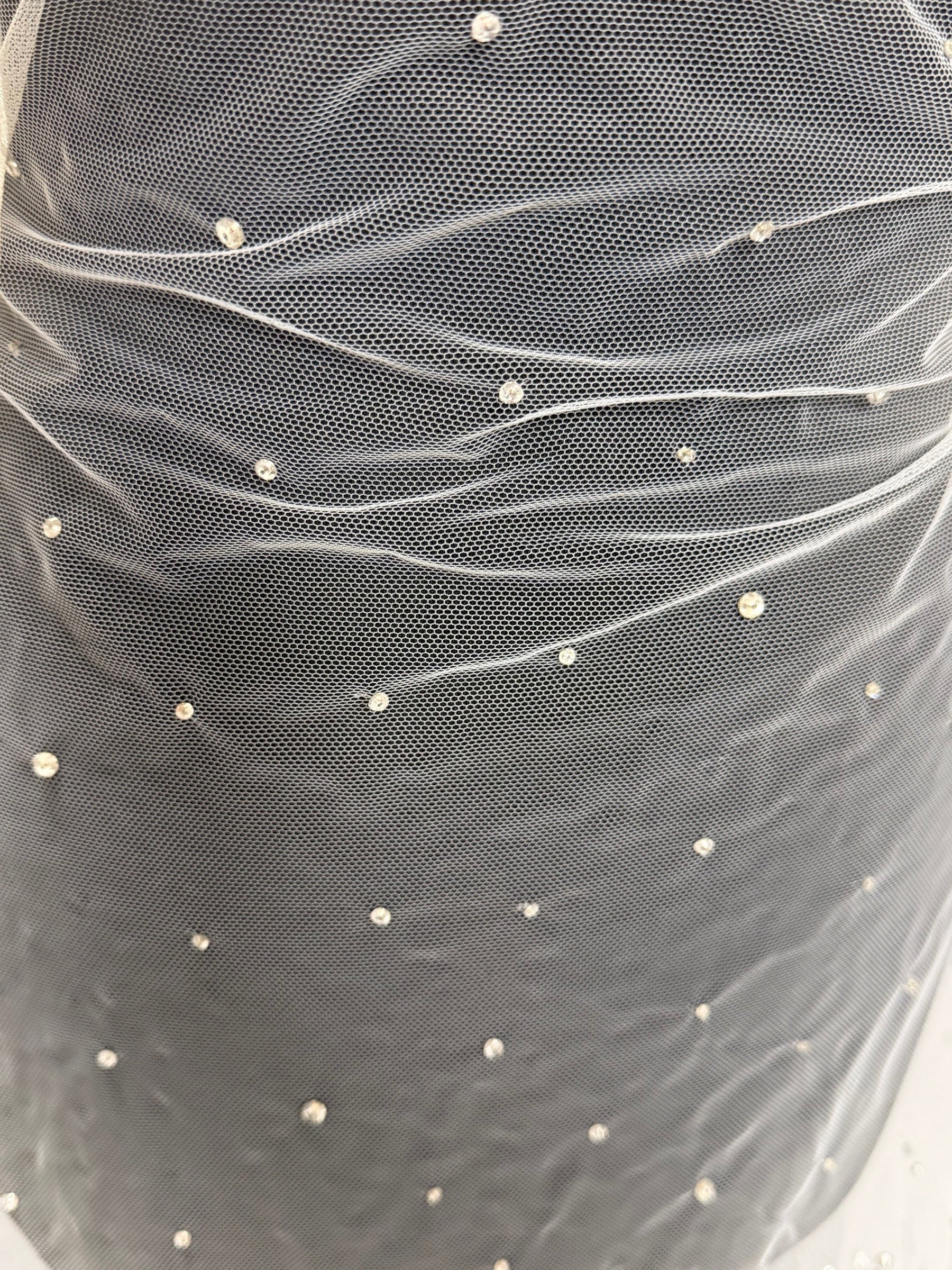 Tulle brodé de perles ivoire - EB1061