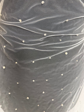 Tulle brodé de perles ivoire - EB1061