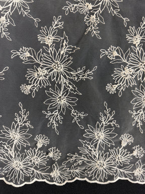 Tulle brodé de perles ivoire - EB1084
