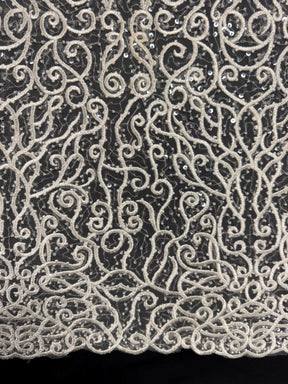 Tulle brodé de perles ivoire - EB1025