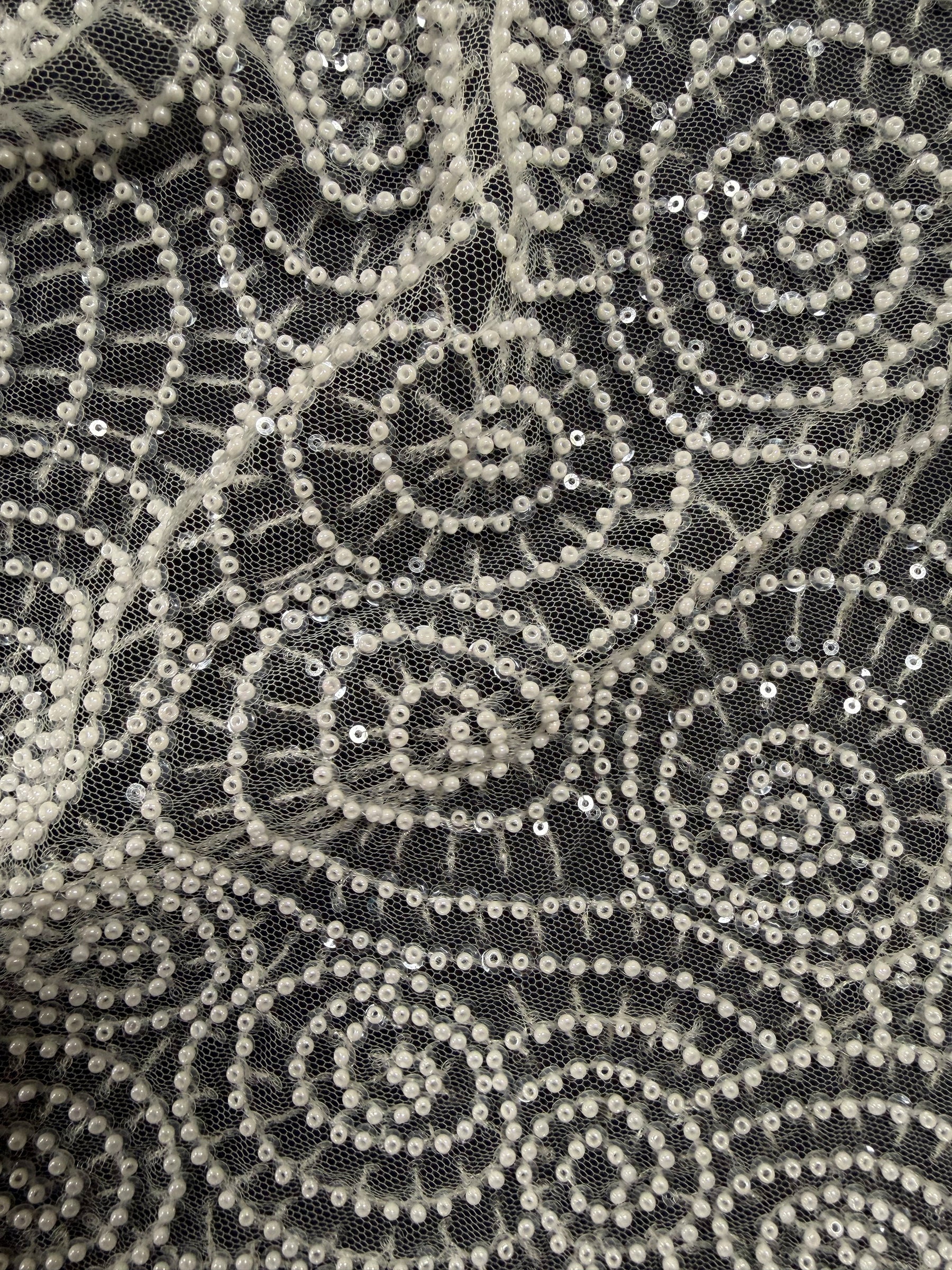 Tulle brodé de perles ivoire - EB1060