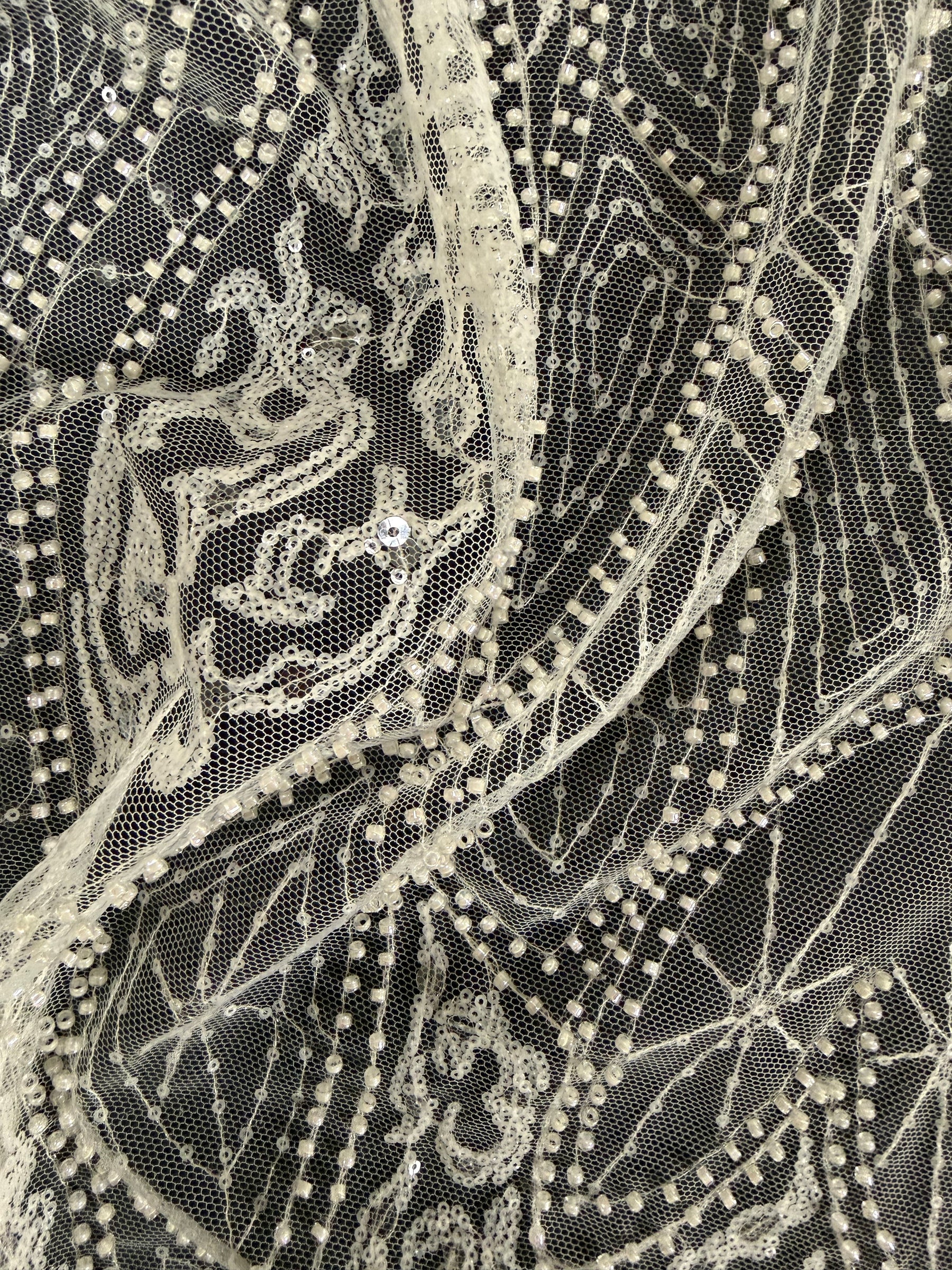 Tulle brodé de perles ivoire - EB1051