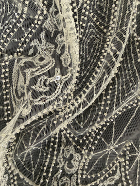 Tulle brodé de perles ivoire - EB1051