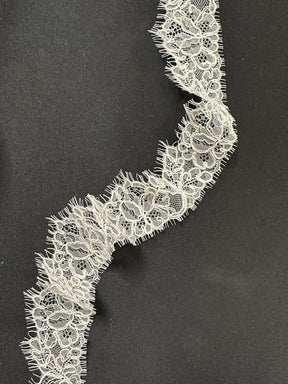 Bordure de robe en cordon ivoire - T829