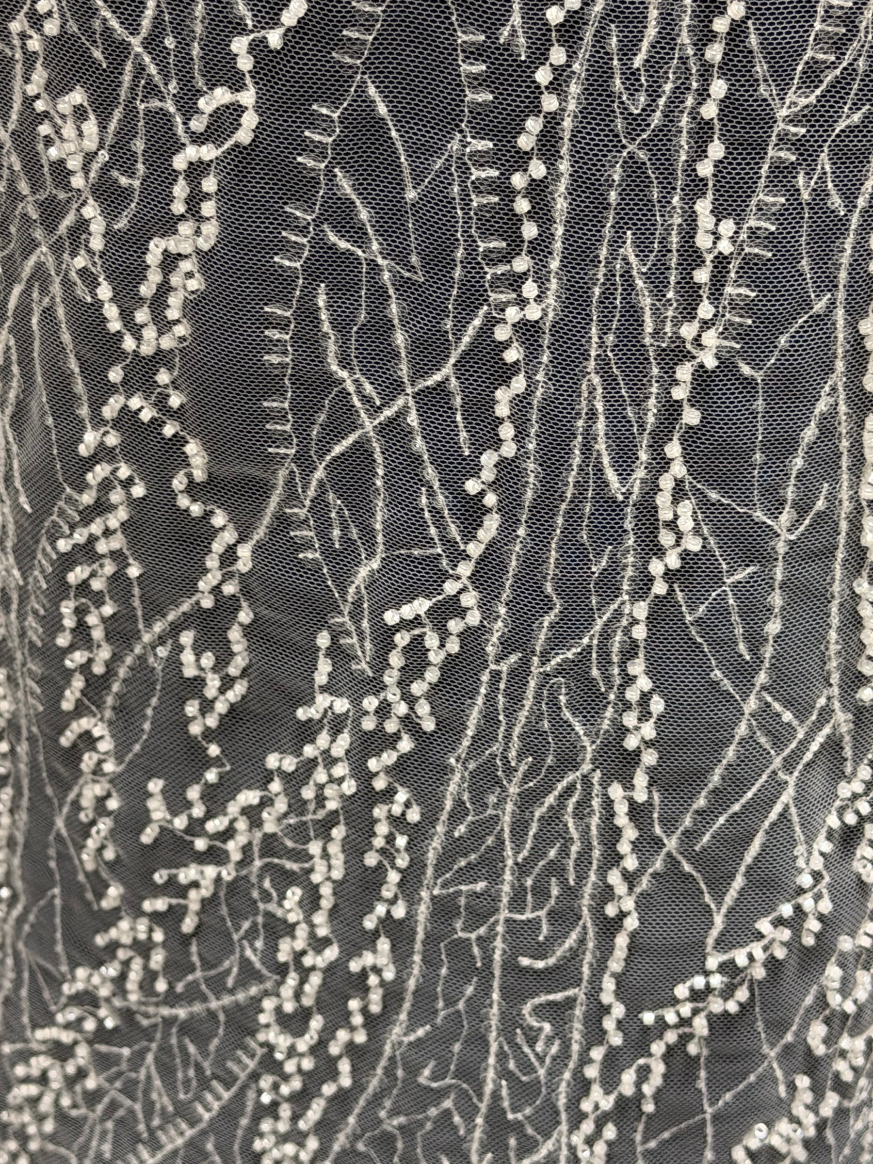 Tulle brodé de perles ivoire - EB1065