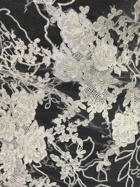 Tulle brodé de perles ivoire - EB1042