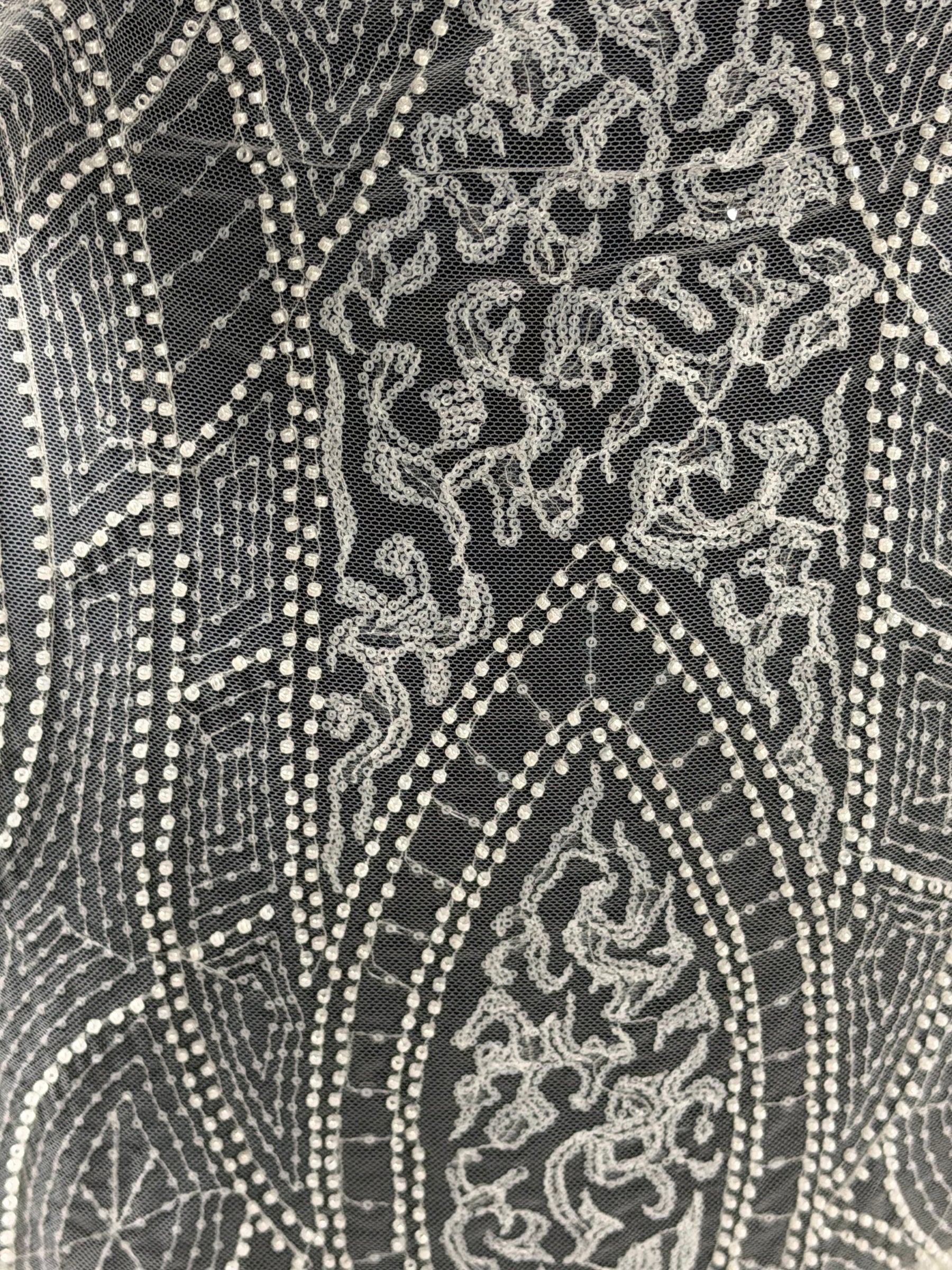Tulle brodé de perles ivoire - EB1051