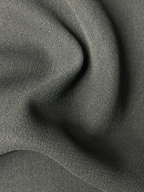 Crêpe double en polyester noir - Leçon