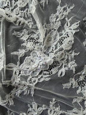Dentelle Raschel perlée à la main ivoire - Jonelle