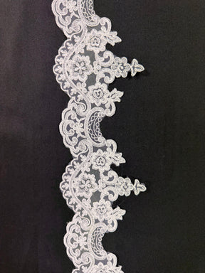 Bordure torsadée brodée ivoire - T870