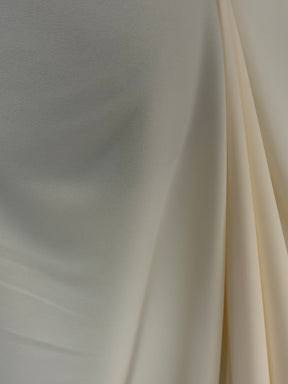 Crêpe de polyester poids moyen ivoire foncé - P59