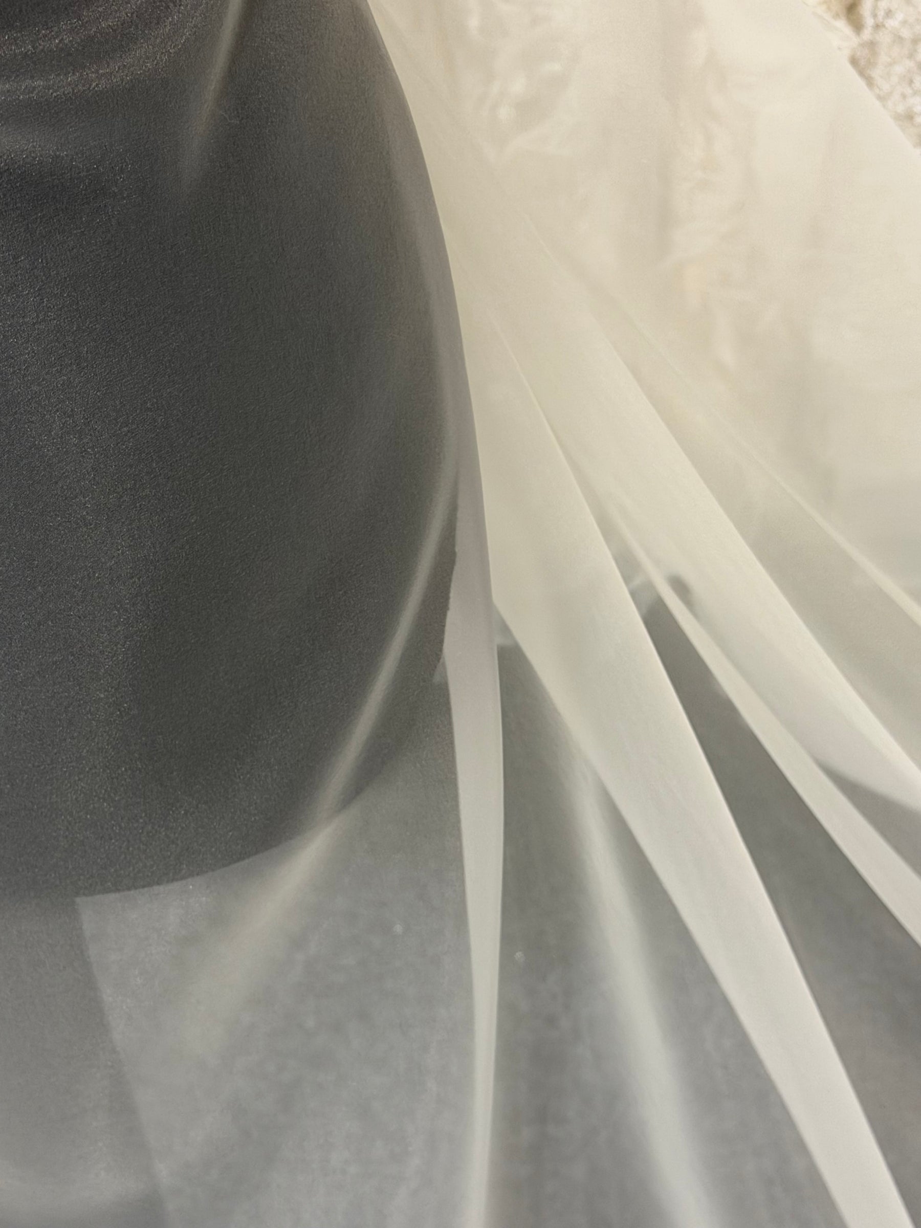 Organza polyester ivoire - P150