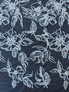 Tulle brodé de perles ivoire - EB1100
