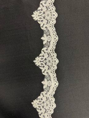 Passementerie en dentelle cordée ivoire - T727