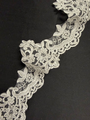 Passementerie en dentelle cordée ivoire - T727
