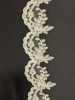 Galon de dentelle festonnée ivoire - T82