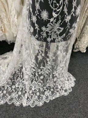Dentelle en ivoire brodée de cordelettes et de sequins - Ladina