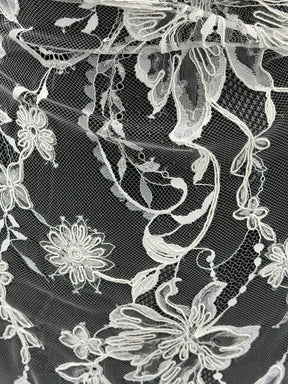 Dentelle en ivoire brodée de cordelettes et de sequins - Ladina