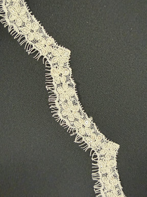Bordure à sequins ivoire - T684