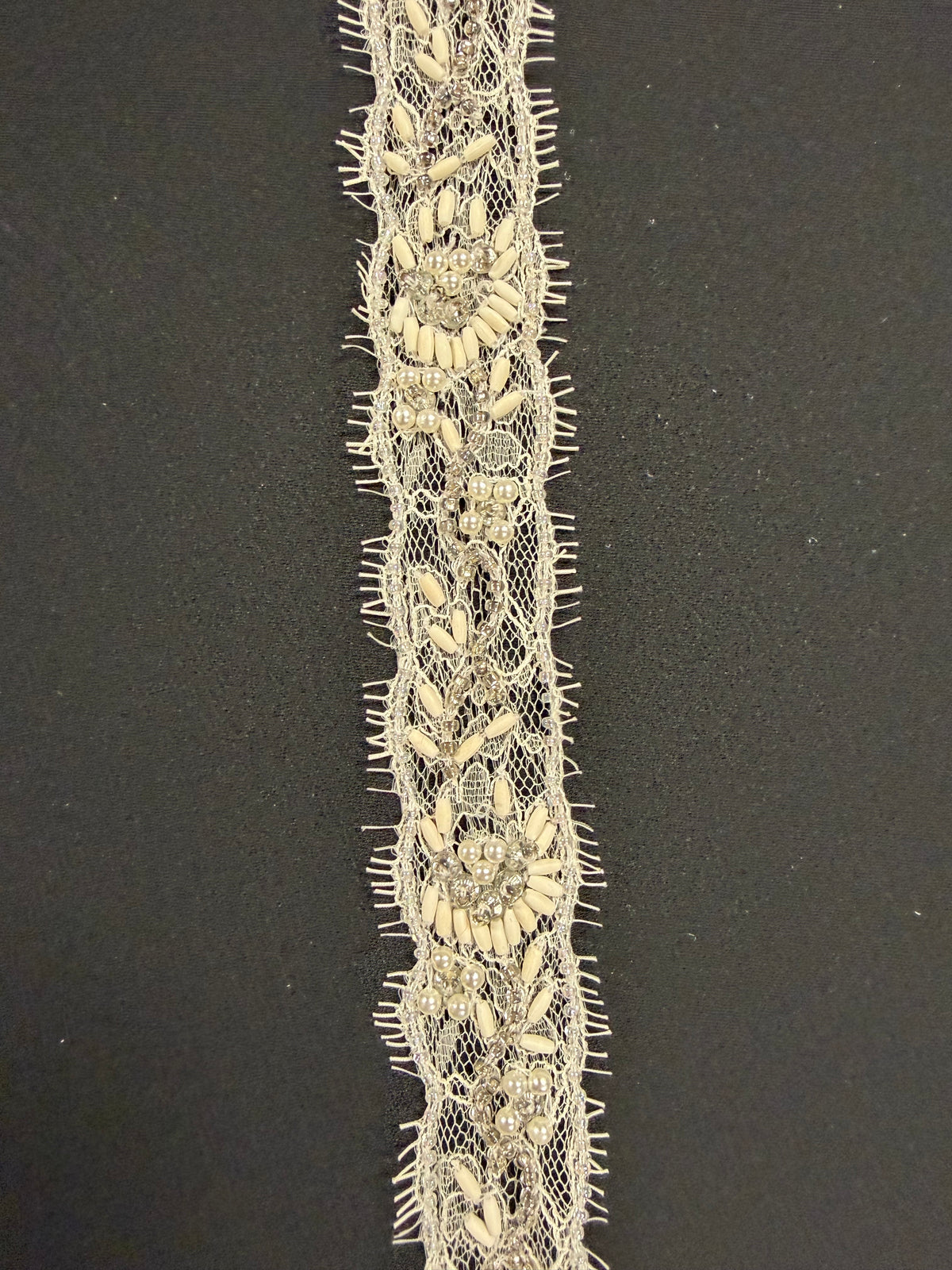 Bordure perlée ivoire - T511