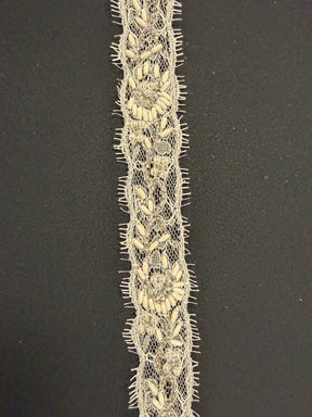 Bordure perlée ivoire - T511