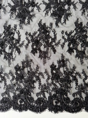 Dentelle noire à cordonnet et perles - P643