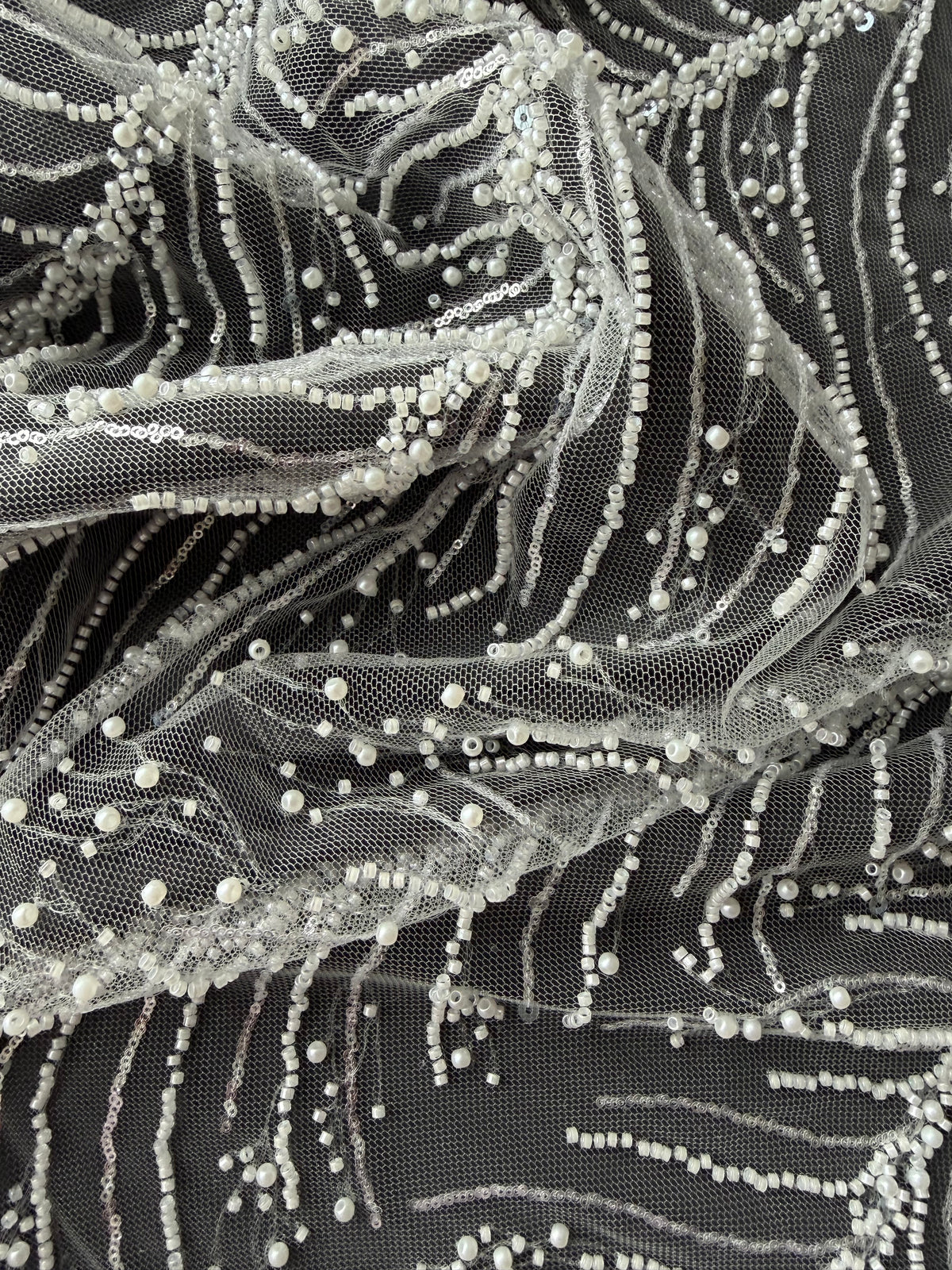 Tulle brodé de perles ivoire - EB1087