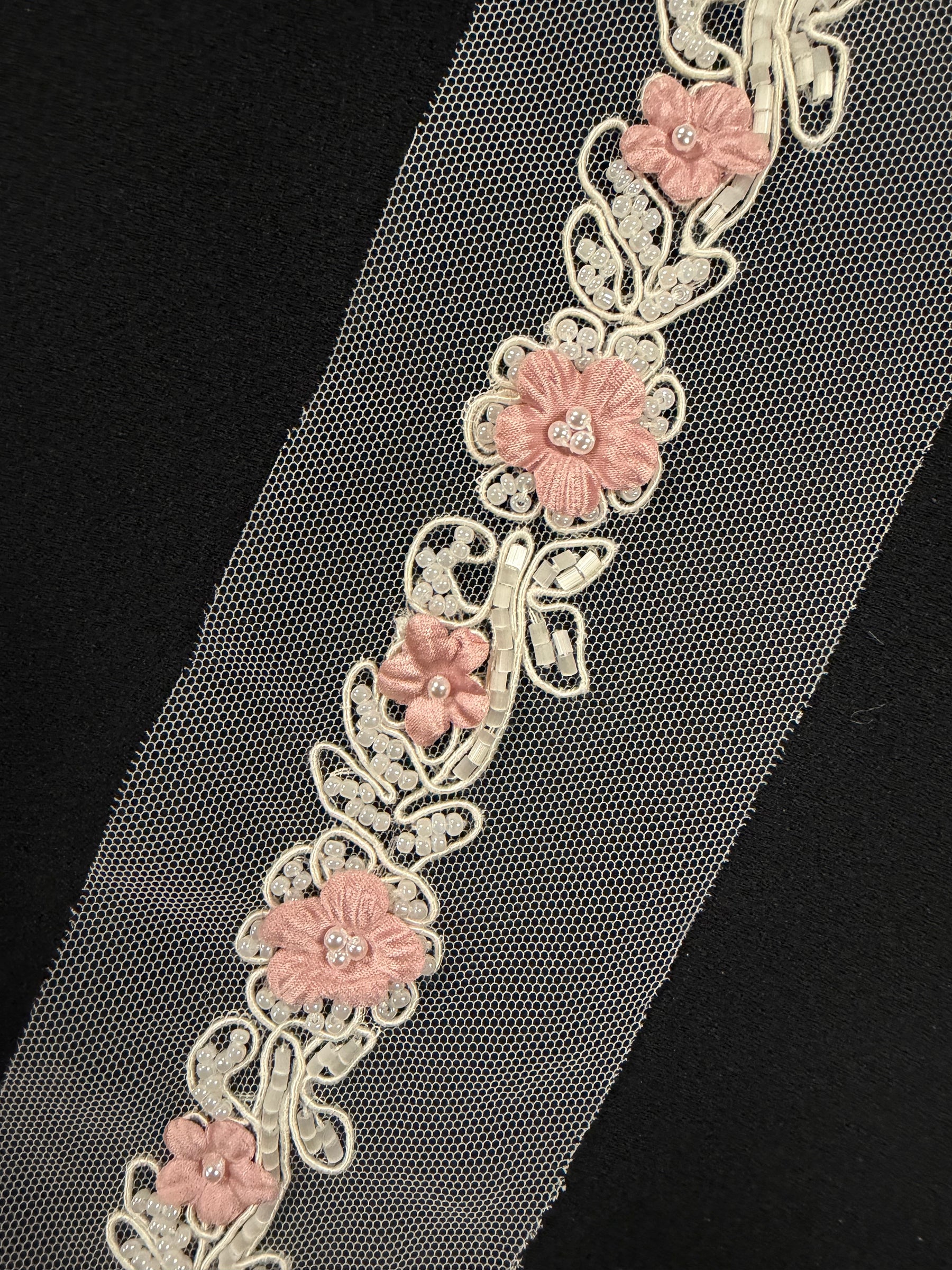 Bordure en perles rose clair - T51