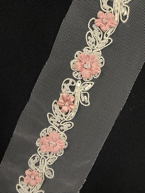 Bordure en perles rose clair - T51
