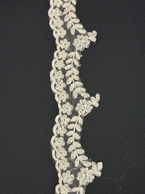 Bordure brodée ivoire/champagne - T35