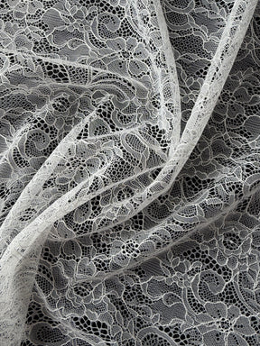 Dentelle Raschel ivoire - P412