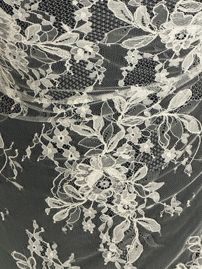 Dentelle Raschel ivoire à cordon - Jara