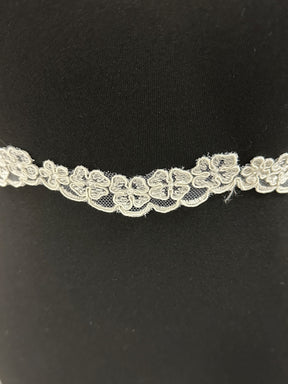 Bordure en dentelle cordée ivoire - T 457 Non perlée (CF)