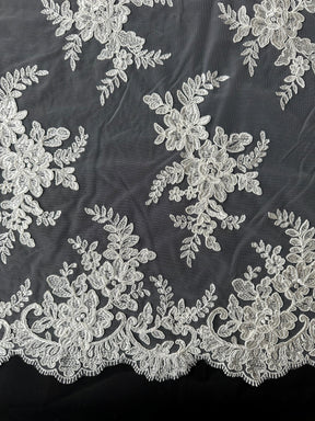 Dentelle brodée ivoire à cordon - P233