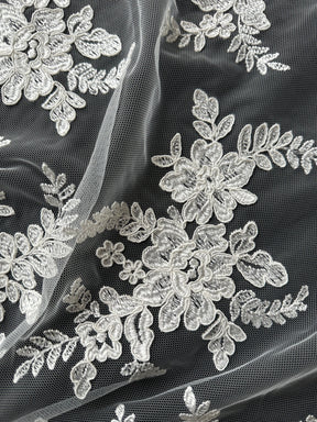Dentelle brodée ivoire à cordon - P233
