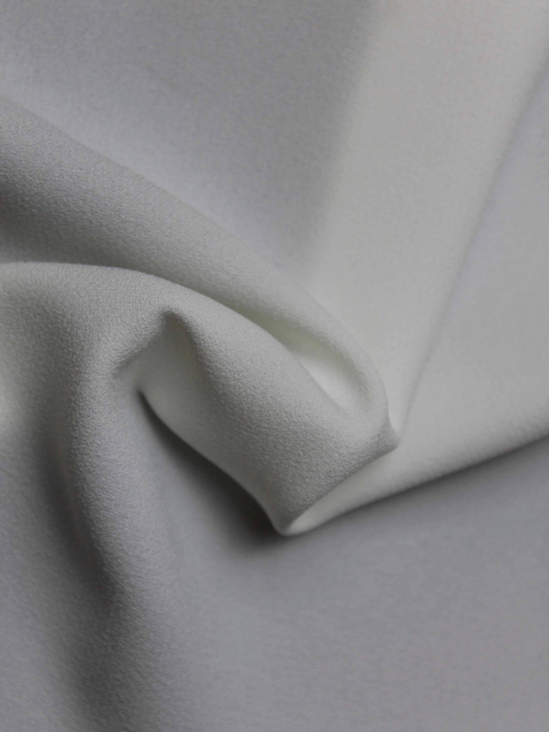 Crêpe polyester ivoire M/Wt - P59